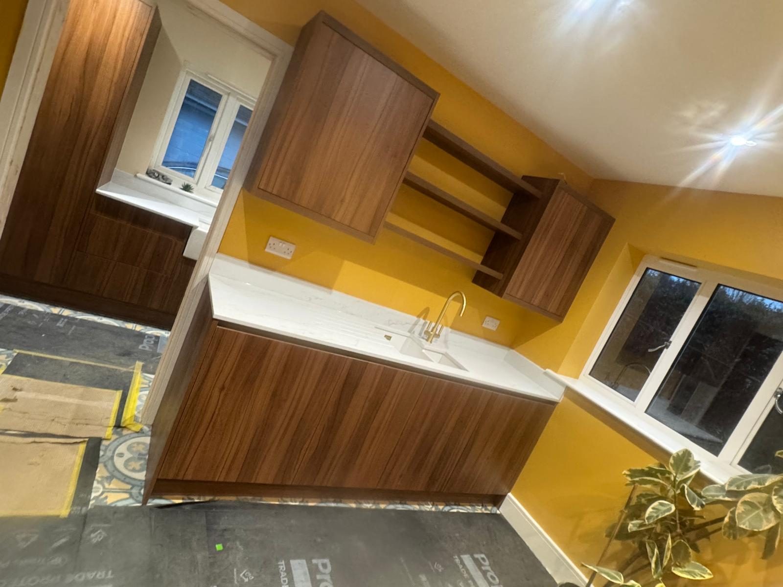 kitchen fitting walnut kitchen units quartz worktop by SGC Carpentry & Construction, Littlehampton, West Sussex